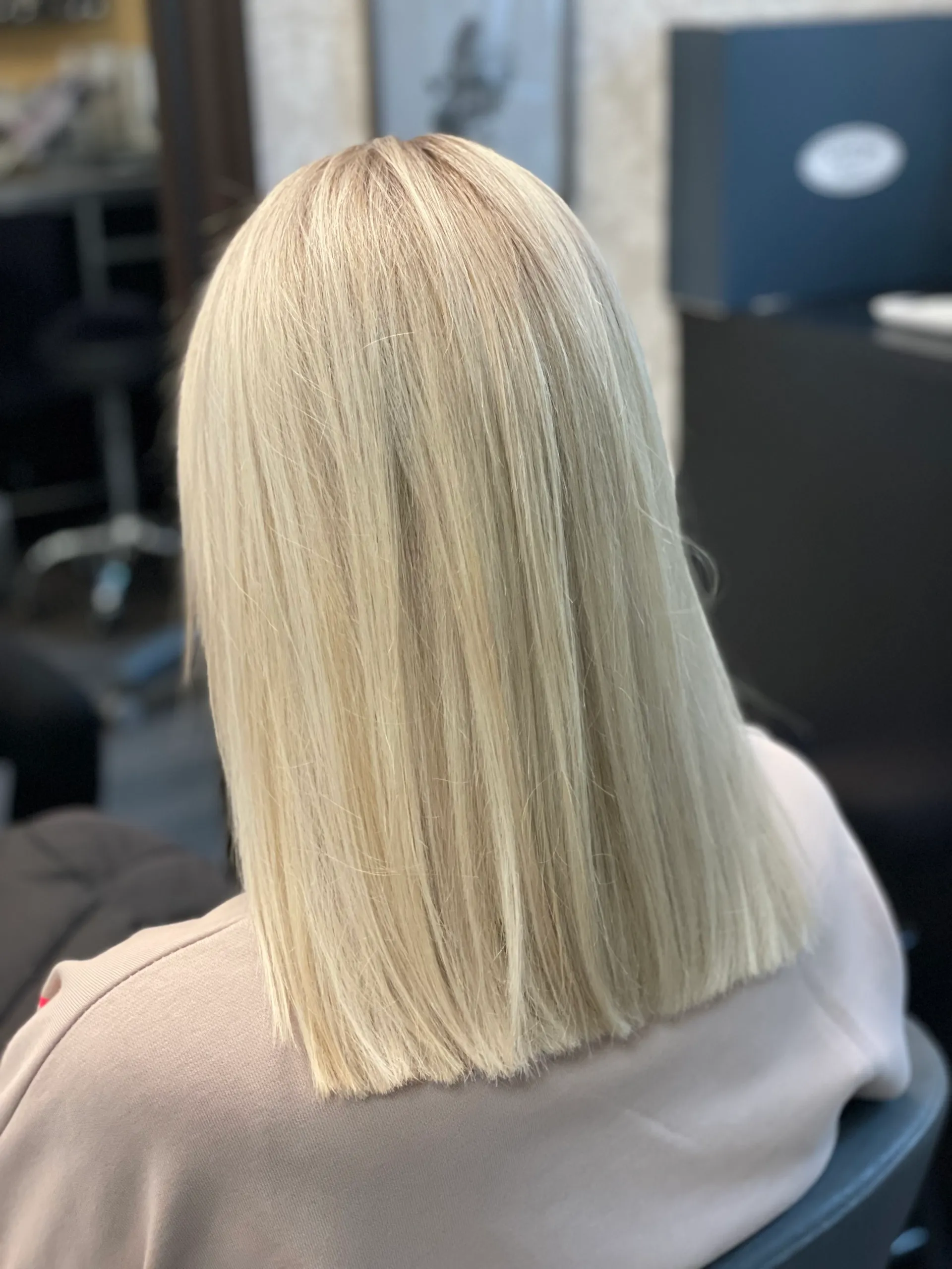Modern blonde balayage with perfect color placement