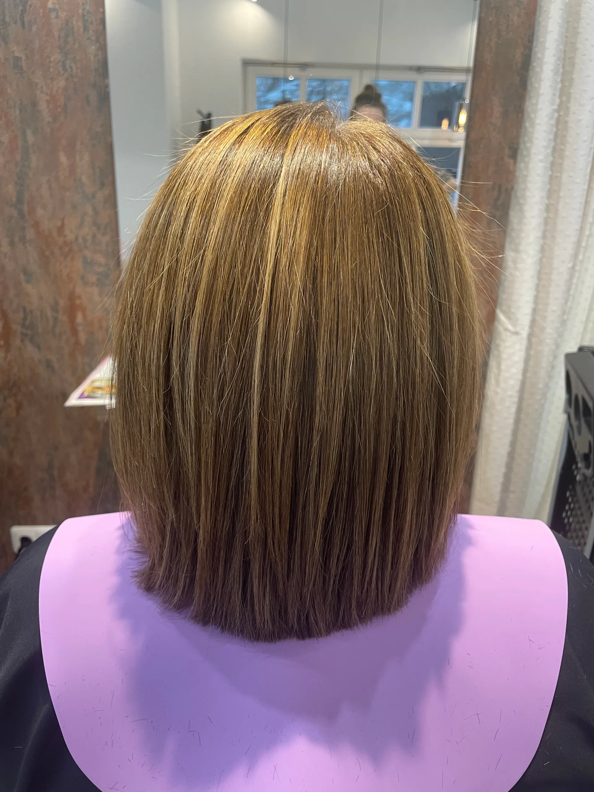 Modern blonde balayage with perfect color placement